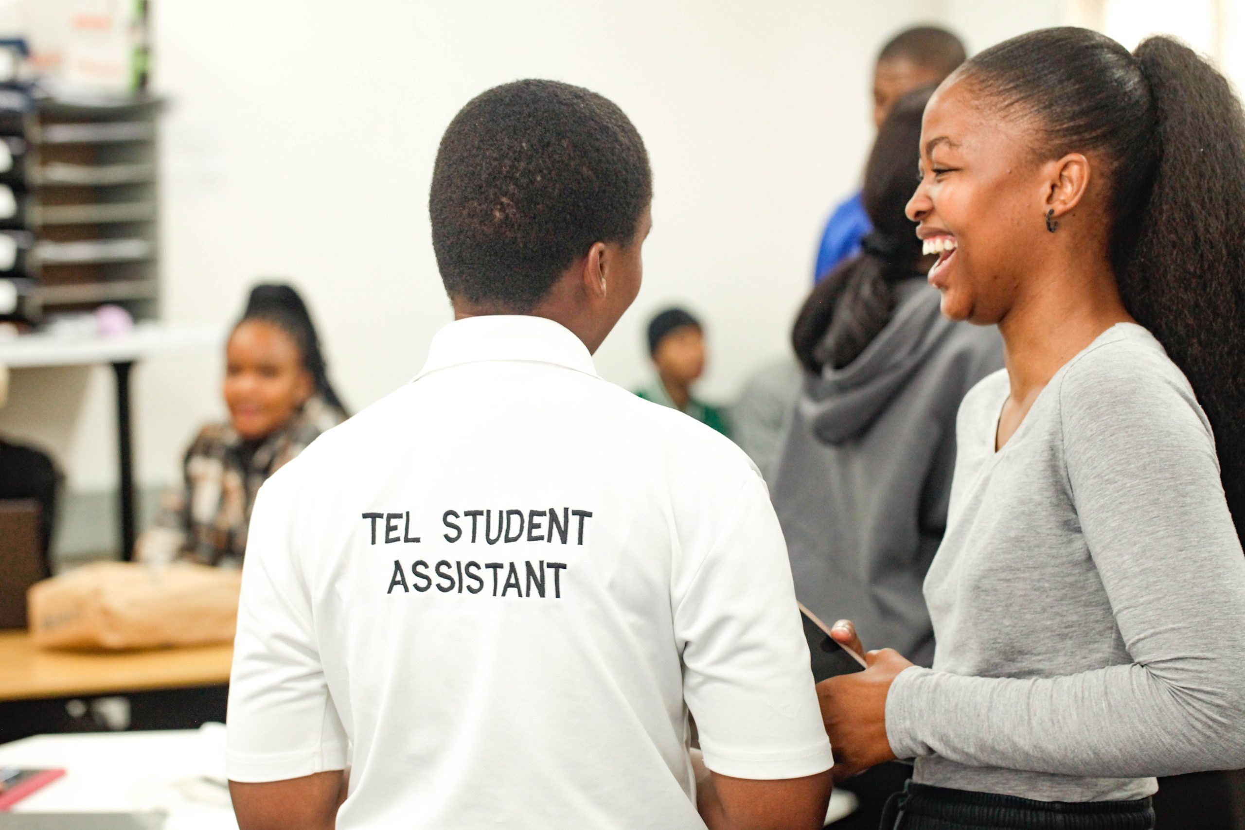 Fort Hare TEL Assistant helping a student in TLC